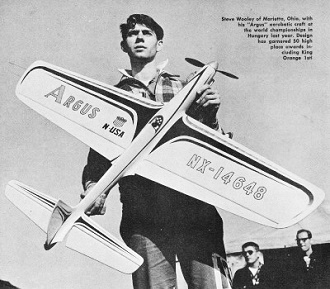 Steve Wooley of Marietta, Ohio, with his Argus aerobatic craft at the world championships in Hungary, August 1961 American Modeler - Airplanes and Rockets