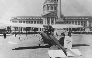 Loughead Sport Biplane History, In San Francisco's Civic Center, film starlet Mary MacLaren imparts some 1920s·type pulchritude - Airplanes and Rockets