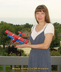 Supermodel Melanie holding Cox Fokker D.VII Biplane - Airplanes and Rockets