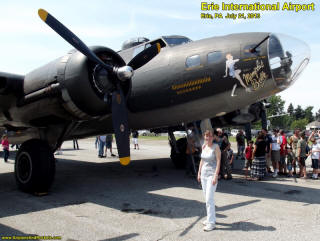 Supermodel Melanie standing by the Memphis Belle B-17 Flying Fortress - Airplanes and Rockets