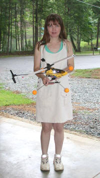 Supermodel Melanie holding the E-flite Blade CP electric helicopter, 8-8-2005 - Airplanes and Rockets