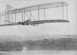 The 1902 glider sails off Kill Devil Hill, Kitty Hawk, on October 21, 1903 - Airplanes and Rockets