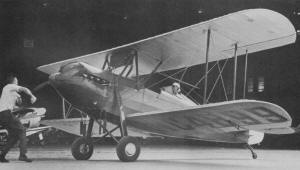 A green and silver 1929 Waco 10 with the Curtiss WWI surplus OX-5 engine - Airplanes and Rockets