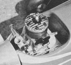 Nose of Thomasian low-winger shows aluminum mounting plate which permitted different engines to be installed for flight testing - Airplanes and Rockets
