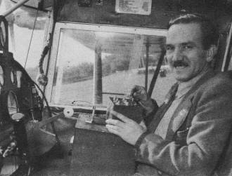 George Redlich, the radio expert, in cockpit of Auster Autocrat - Airplanes and Rockets