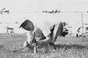 Orville H. Carlisle, NAR's first, and #1, member, preparing to launch one of his original 1957 model rockets - Airplanes and Rockets