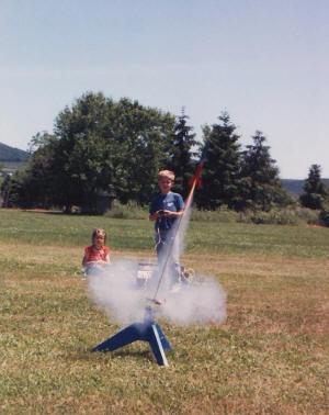 Philip launches his Estes Alpha while Sally watches - Smithsburg, MD - Airplanes and Rockets