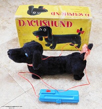 Vintage Electromechanical Dachshund Toy - Airplanes and Rockets