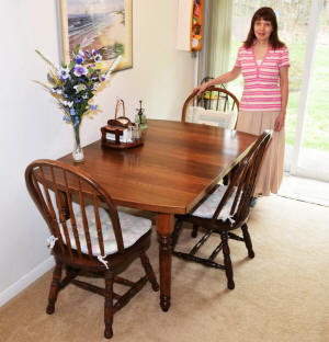 Antique dining room table (Supermodel Melanie with her redesigned table) - Airplanes and Rockets