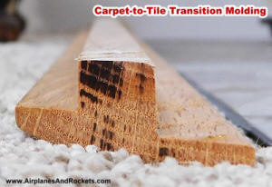 Oak carpet-to-tile transition molding (end view) - Airplanes and Rockets