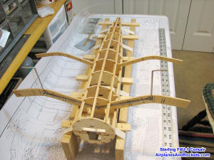 Sterling F4U-1 Corsair fuselage bottom assembly on an alignment jig - Airplanes and Rockets