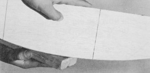 Final shaping to outline is done with coarse garnet paper - Airplanes and Rockets
