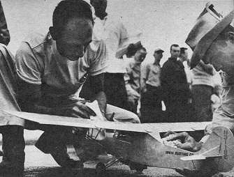 Thomas Dean of Corpus Christi dries off his Aeronca - Airplanes and Rockets