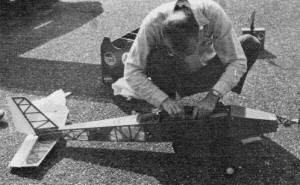 Preparing for the flight the author is engrossed with the plumbing - Airplanes and Rockets