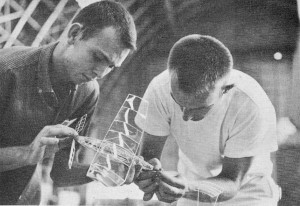 All About Air Modeling, Annual Edition 1962 Model Aviation - Tense moment comes during indoor event when fully-wound rubber motor is atÂtached to removable tail boom - Airplanes and Rockets