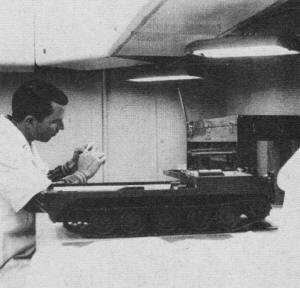 Laboratory technician works on a brass part - Airplanes and Rockets