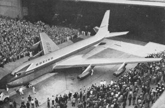 Speed Is in Every Line of the big, new brown-and-yellow Stratoliner - Airplanes and Rockets