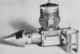 Left-side of K&B 15RS with cylinder sleeve shows "lumps" on case where three ports are located, Inside the 2-Cycle Engine, February 1968 AAM - Airplanes and Rockets
