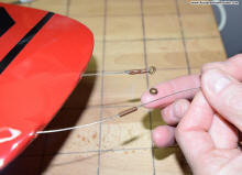 Slide the metal crimp tube over the line - Airplanes and Rockets