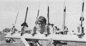 1967 Junior Champion Charles Dueller checks the igniter in his scale I.R.I.S. bird amid the competition - Airplanes and Rockets